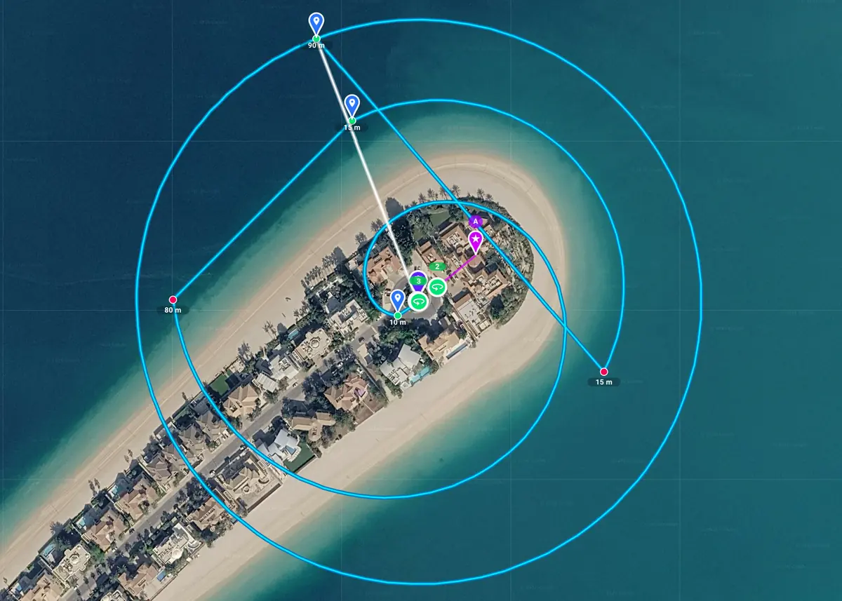 Órbitas circulares y en espiral planificadas alrededor de un punto de interés en la punta de una isla con playa
